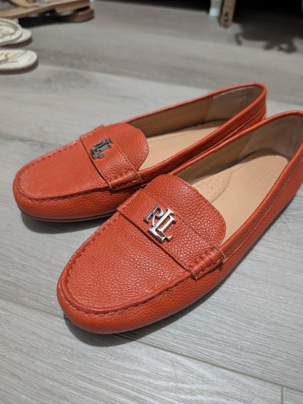 Lauren Ralph Lauren Barnsbury Pebbled Leather Driver loafers in Rust Orange.